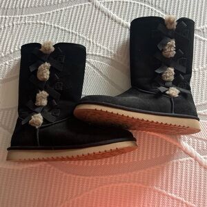 Koolaburra Black Ankle Boots with Bow and Pom Accents